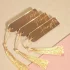 Name tags, gold tassel, wedding favours