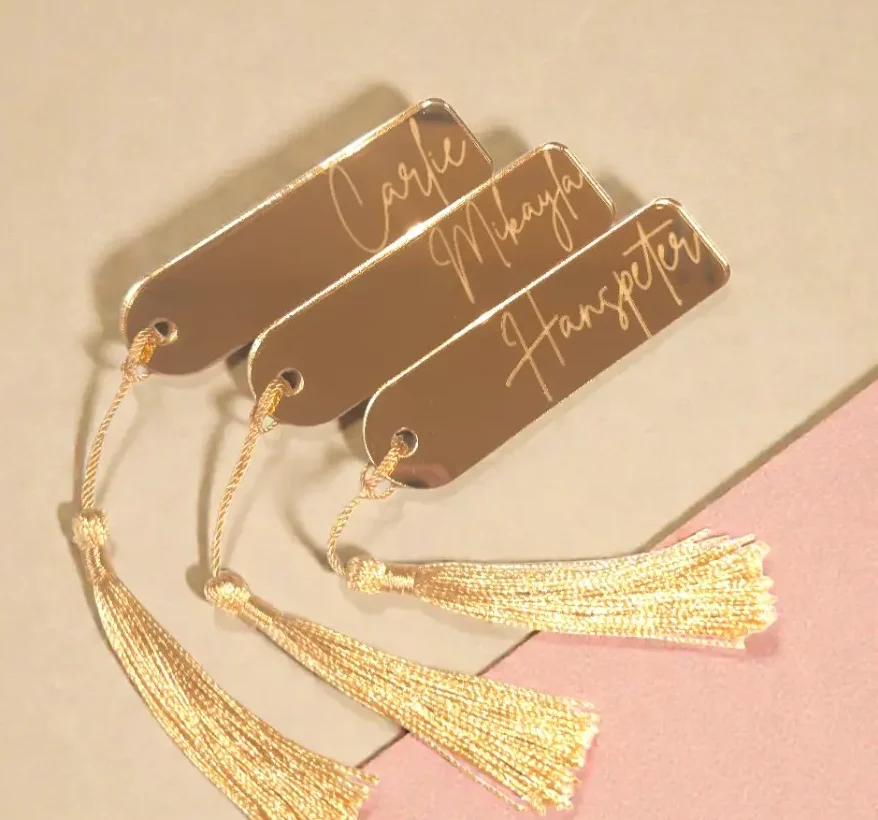 Name tags, gold tassel, wedding favours